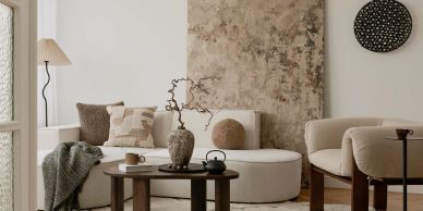 Cozy modern living room with neutral tones and stylish decor.