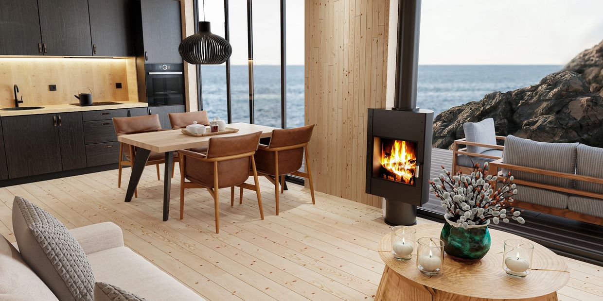 Modern coastal living room and kitchen with wood accents and ocean view.