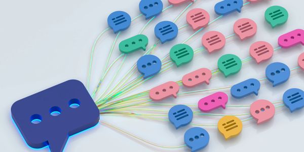 Colorful chat bubbles connected by lines, representing communication flow.