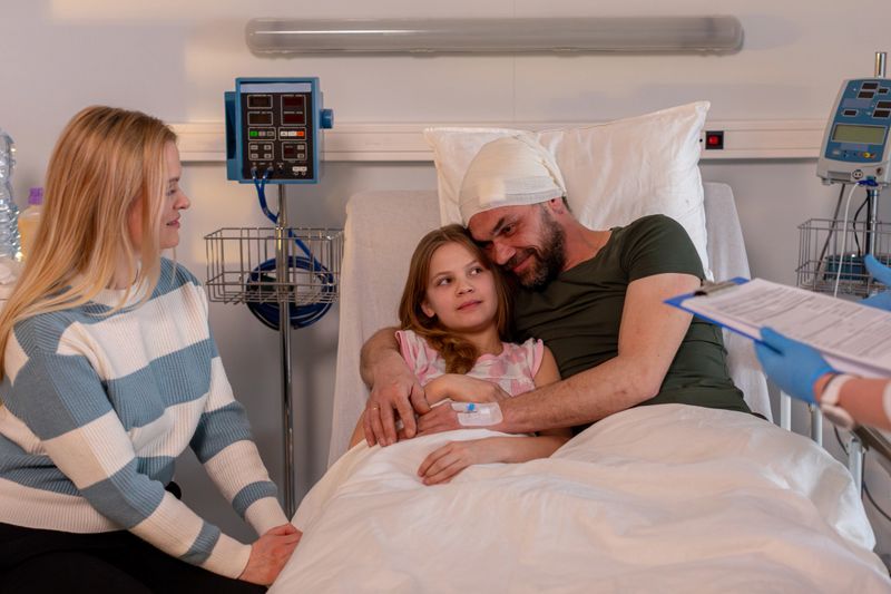 A deeply touching and heartfelt moment unfolds as a loving family comes together in a supportive hospital setting