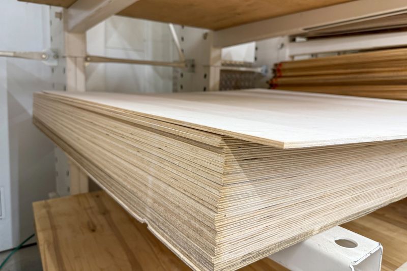 Sheets of plywood in a warehouse or hardware store. Material for repair, construction or carpentry work