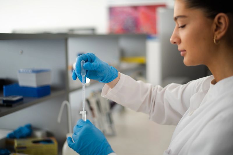 Lab technician scientist makes chemical analysis