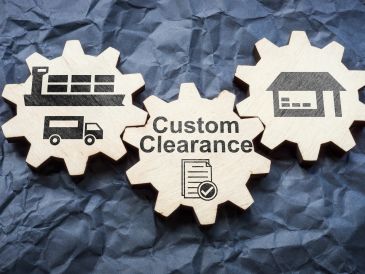 Wooden gears symbolizing custom clearance and logistics processes.