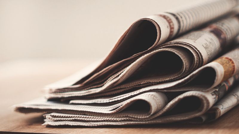 Different newspapers on the table
