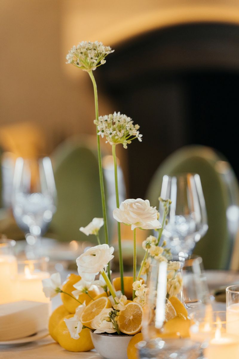 Event decor with white orchids and other white flowers in a restaurant. Restaurant design. High quality photo