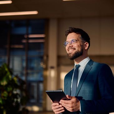 Businessman excited for the new age of janitorial, construction, and project management services for the future.