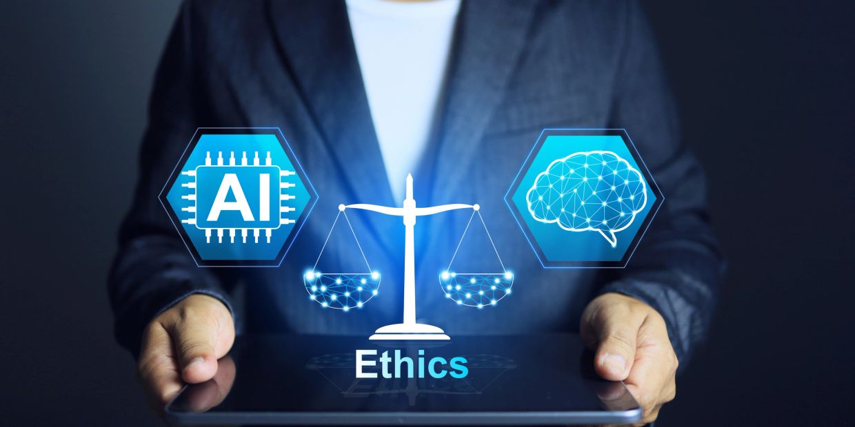 Person holding tablet displaying AI, brain, and ethics balance scale.