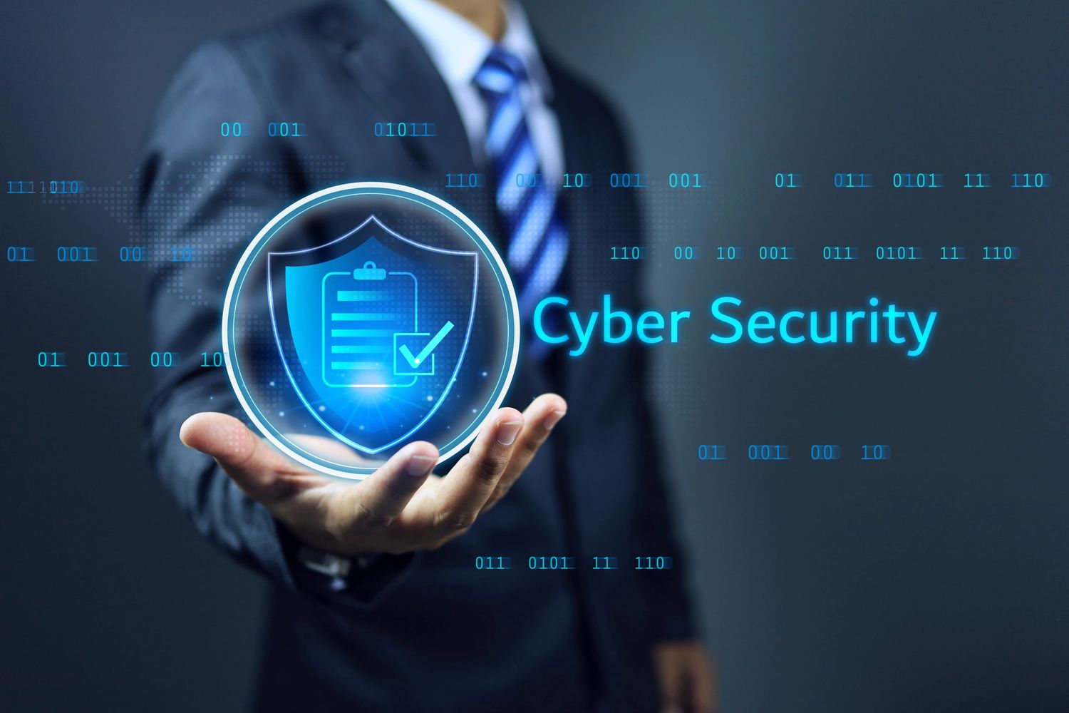 Businessman presenting cyber security concept with digital shield and binary code.