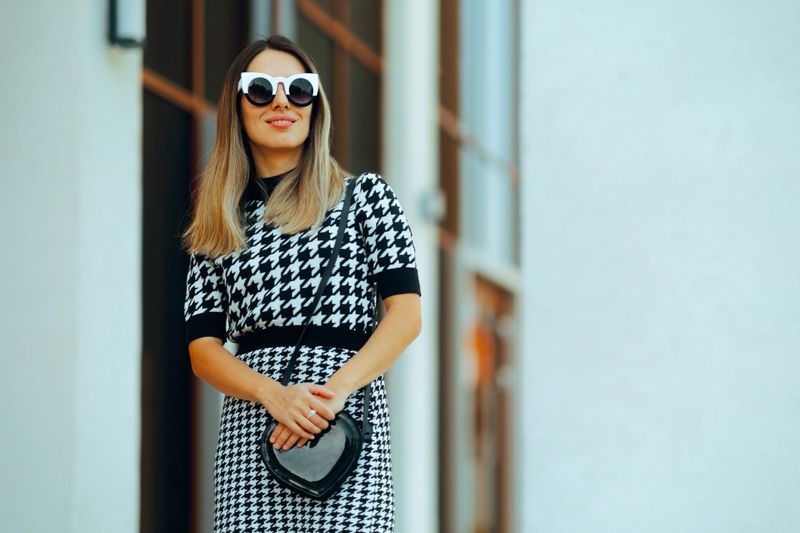 Trendy lady wearing an outfit set made of a blouse and a skirt