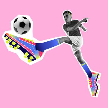 Soccer player in mid-air kick with colorful cleats on pink background.