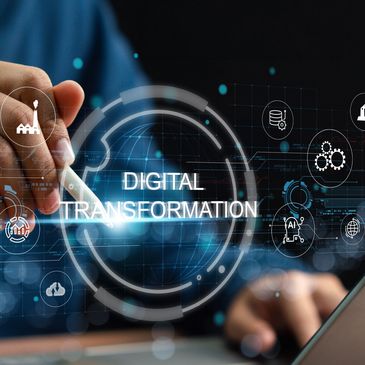 Hand interacting with digital interface labeled 'Digital Transformation'.