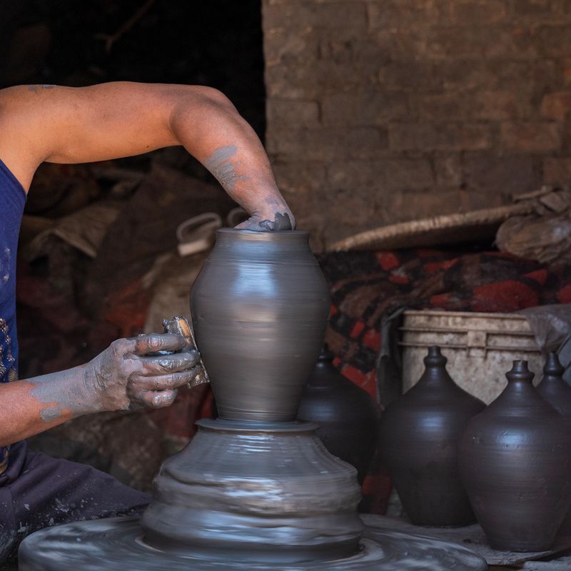 Pottery Square in Bhaktapur is a vibrant hub of traditional craftsmanship. Here, local artisans skillfully shape clay into beautiful pots, vases, and sculptures, preserving centuries-old techniques. The open courtyard, filled with drying pottery, offers a unique and immersive experience.