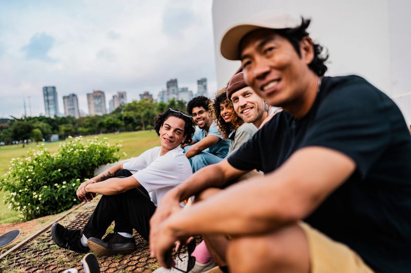 Portrait of friends relaxing at Ibirapuera park in São Paulo, Brazil