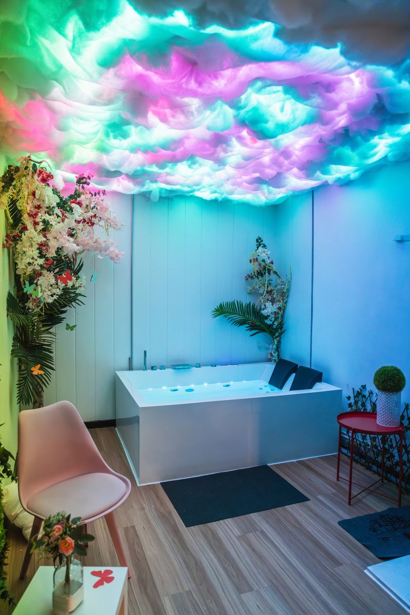 Modern beauty spa room with led lights and flower decorations, creating a dreamy and relaxing atmosphere for clients seeking wellness and pampering
