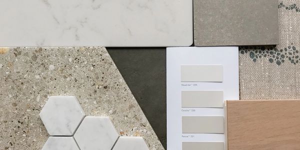 Various tile and color samples for interior design.