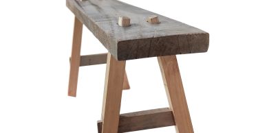 Rustic wooden bench with natural finish.