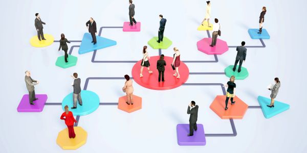 Businesspeople connected on colorful platforms illustrating organizational structure.