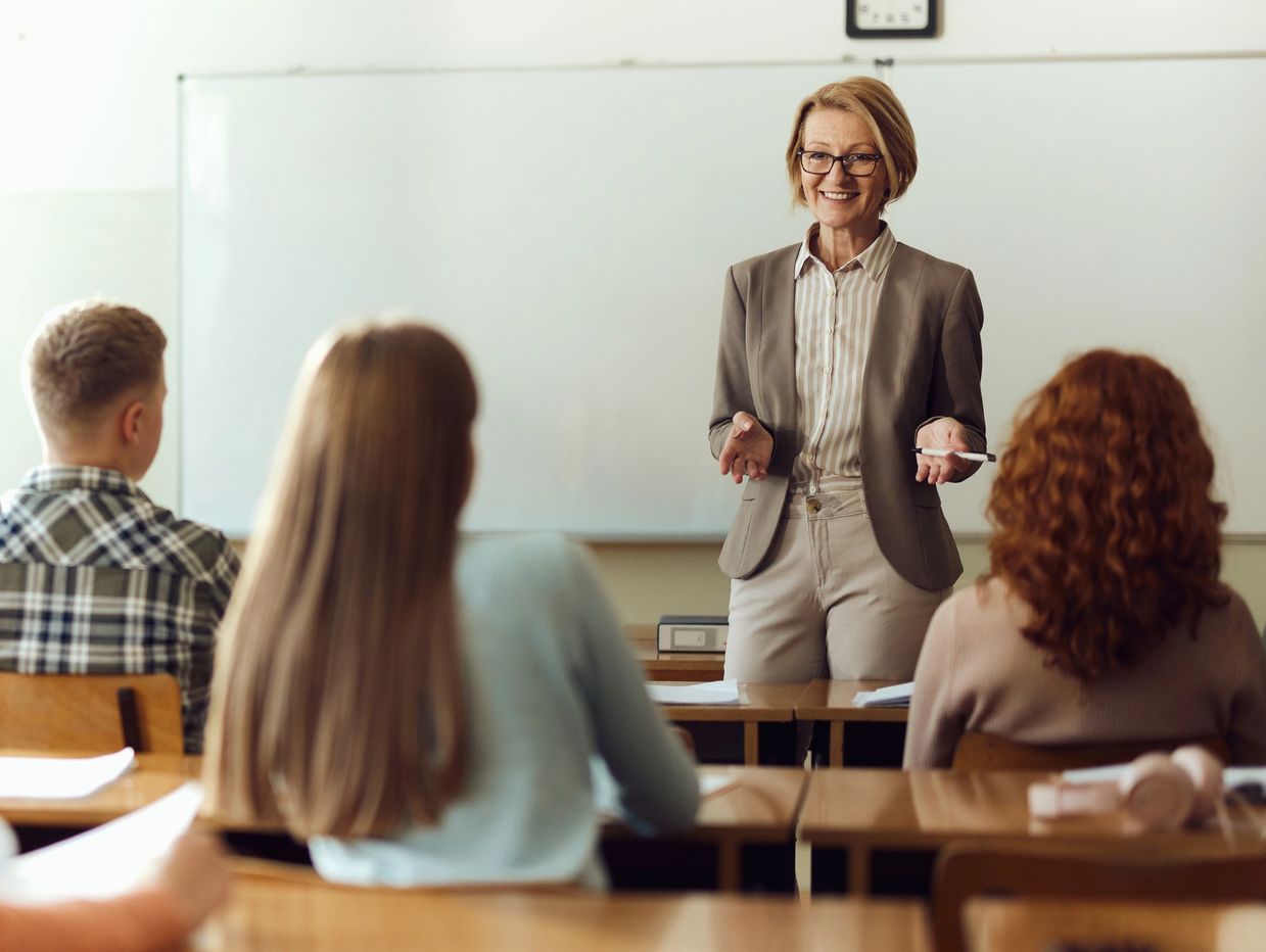 Teacher engaging students in a classroom.