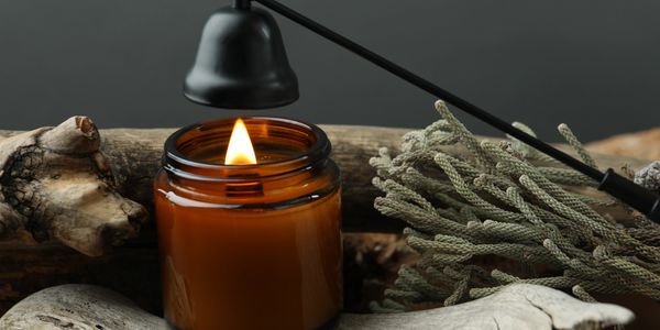 a candle burning with a rope around it