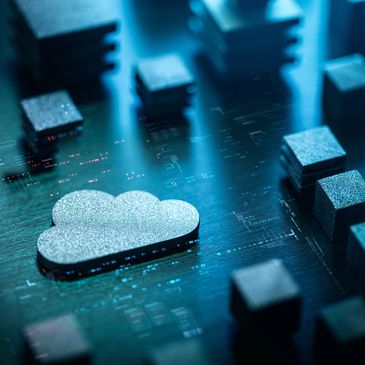 Metallic cloud icon on a circuit board surrounded by stacked cubes.