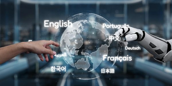 Human and robot hands reaching toward a digital globe with multiple language names.