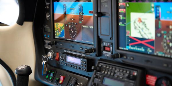 Close-up of an aircraft cockpit display panel.