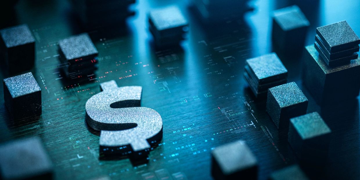 Metallic dollar sign surrounded by cubes on a digital surface.