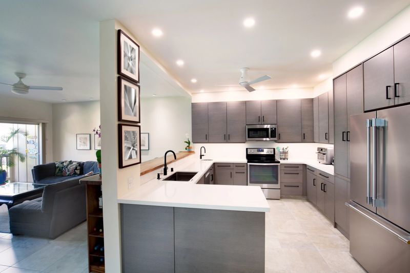 A contemporary renovation remodeled  open concept kitchen interior design  in a modern Condominium Apartment residential home.