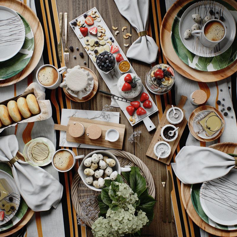 Digitally rendered elegant breakfast table featuring plates of fine cuisine, fresh fruits, and exquisite décor. Highlights include delicious beverages, decorative arrangements, and a variety of small dishes, creating an inviting and sophisticated dining setting. Perfect for showcasing culinary artistry and lifestyle inspiration.