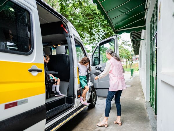 Taking children to school.
