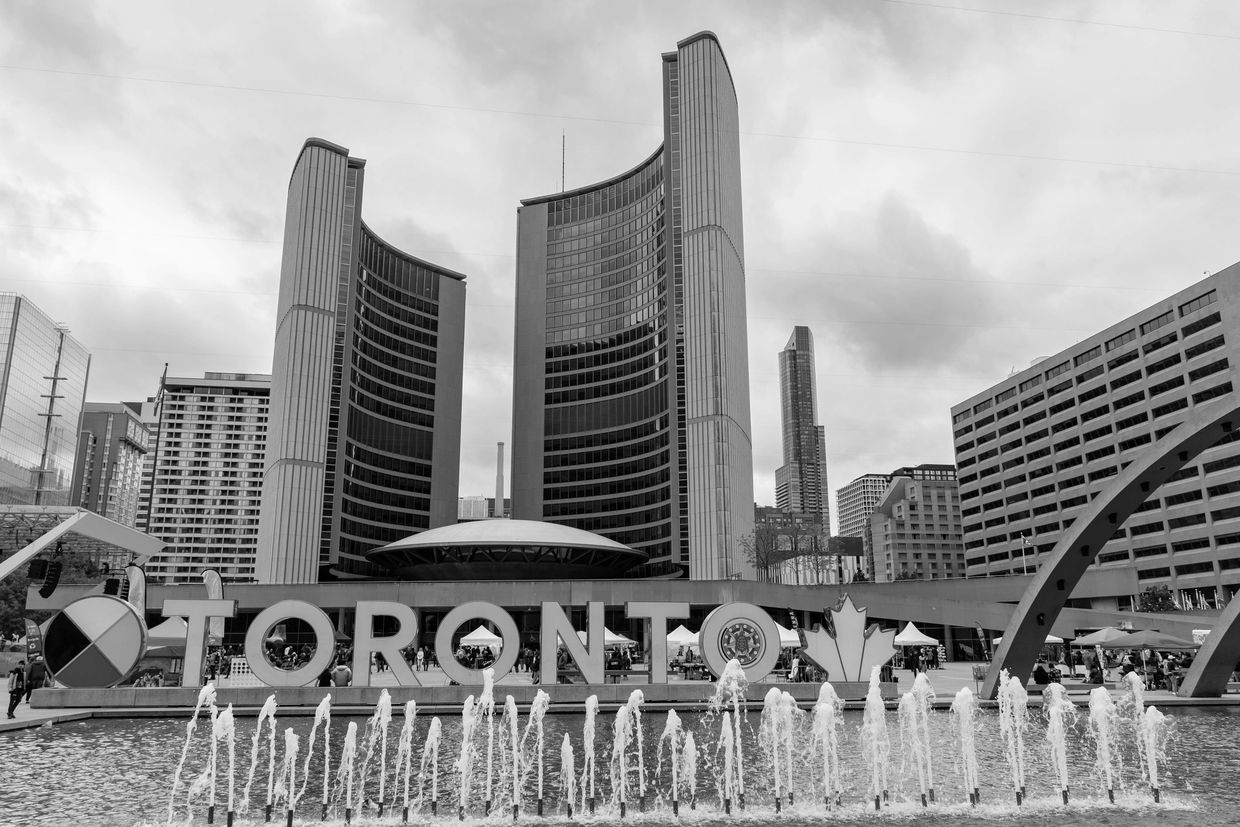 Toronto City Hall at Nathan Phillips Square show in downtown skyline where local electricians serve