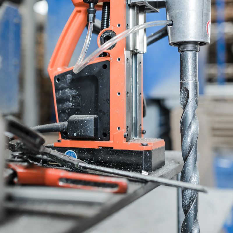 A series of high-resolution images capturing various stages of metalworking and industrial manufacturing. The photos showcase precision machinery, manual measurement with calipers, and industrial control systems used in a professional metal fabrication environment. These visuals reflect the core values of quality, efficiency, and craftsmanship in the modern metal industry, highlighting both advanced automation and skilled manual labor.