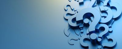 Pile of blue question marks representing frequently asked business coaching questions