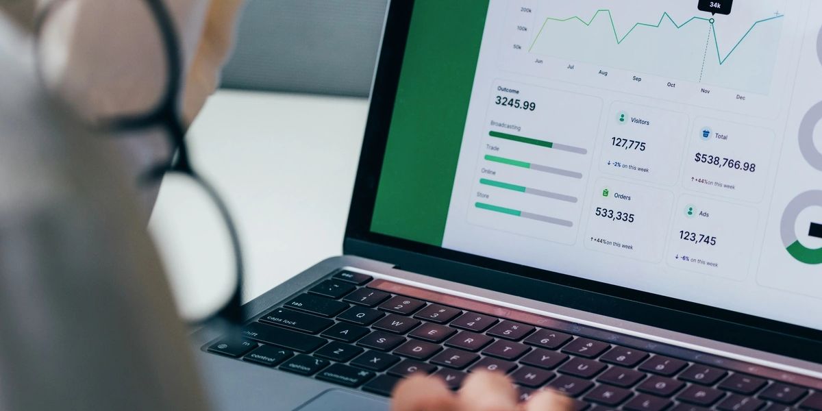 Person reviewing credit score and financial documents