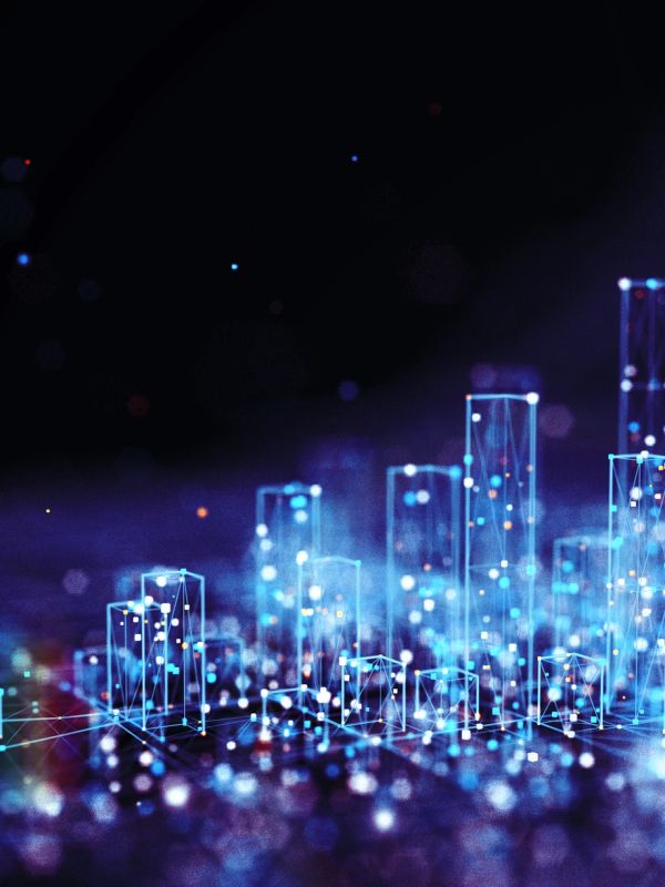 Digital cityscape with glowing blue geometric buildings.
