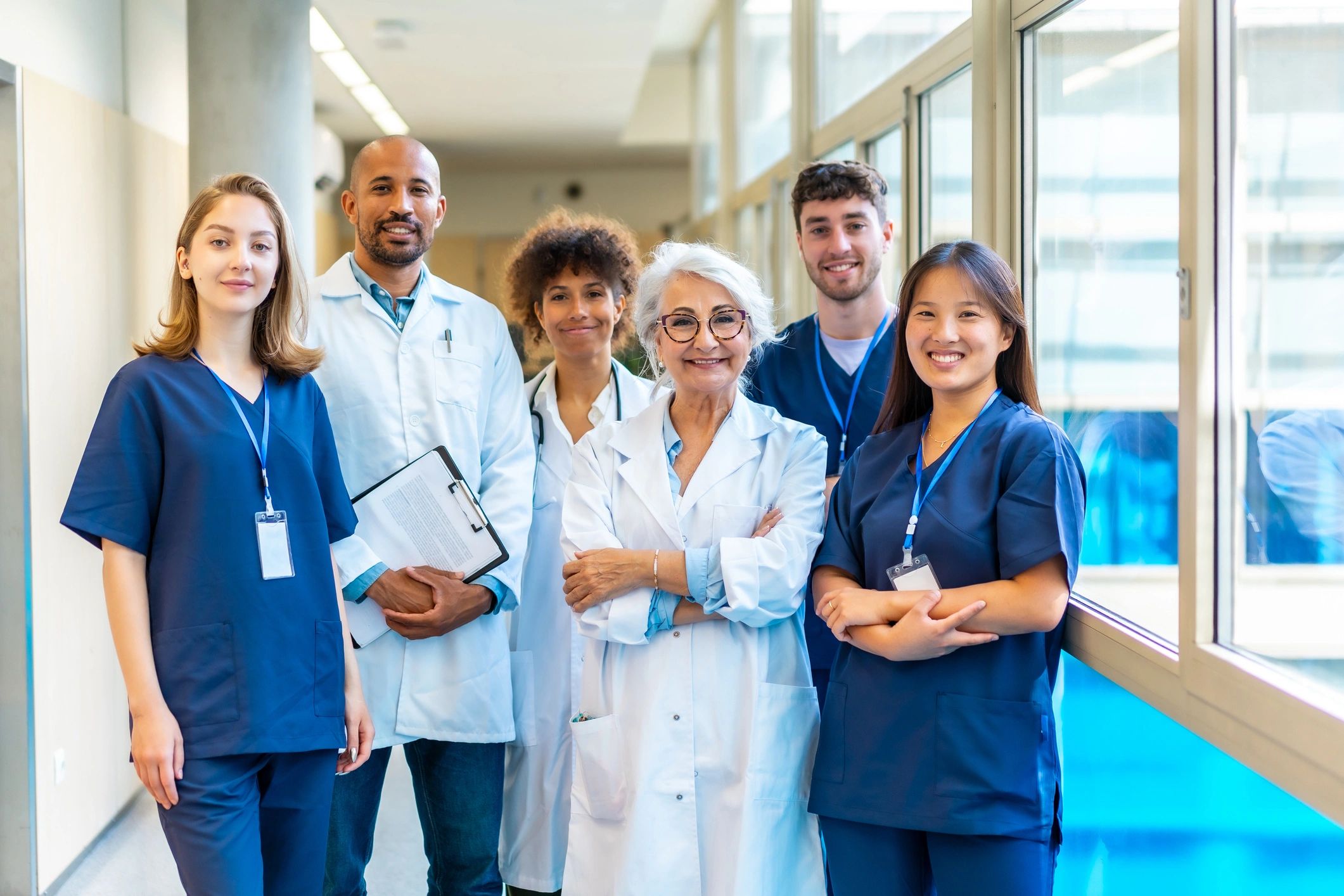 Medical Professionals in a medical facility all wearing uniforms