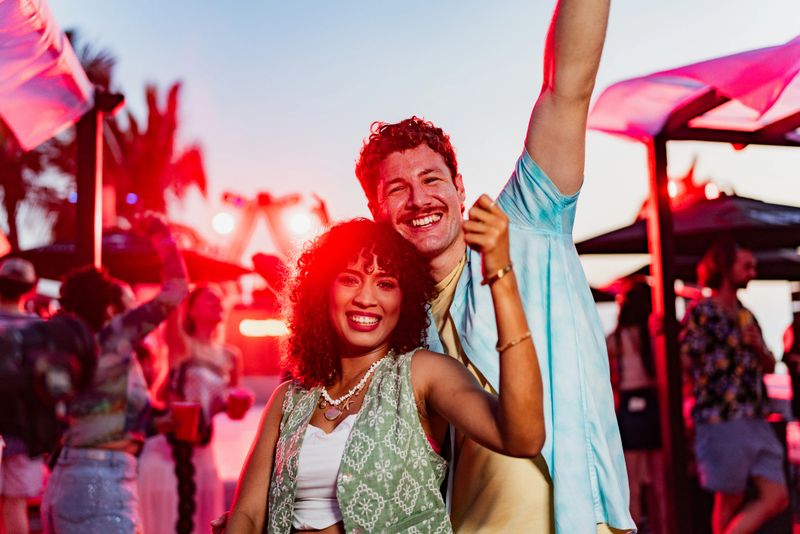 Portrait of young couple on party outdoors