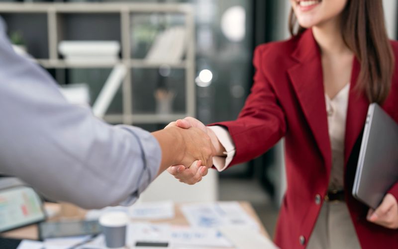 Business people handshake - business meeting and partnership concept copy space