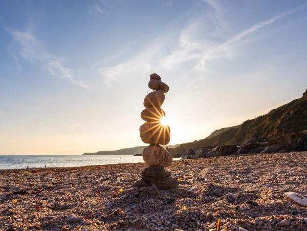 Stacked rocks near a coastline