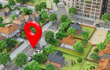 3D map view with red location marker indicating a specific spot in a neighborhood.