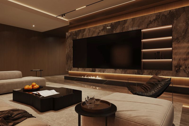 A luxurious living room focused on a feature wall with a large TV, vertical wood slats, marble panels, and a sleek, modern fireplace. A stylish coffee table sits in the foreground. 3D render