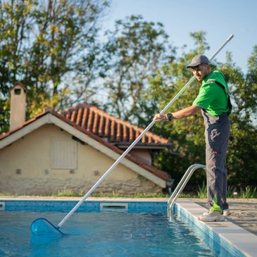 pool guy cleaning the pool