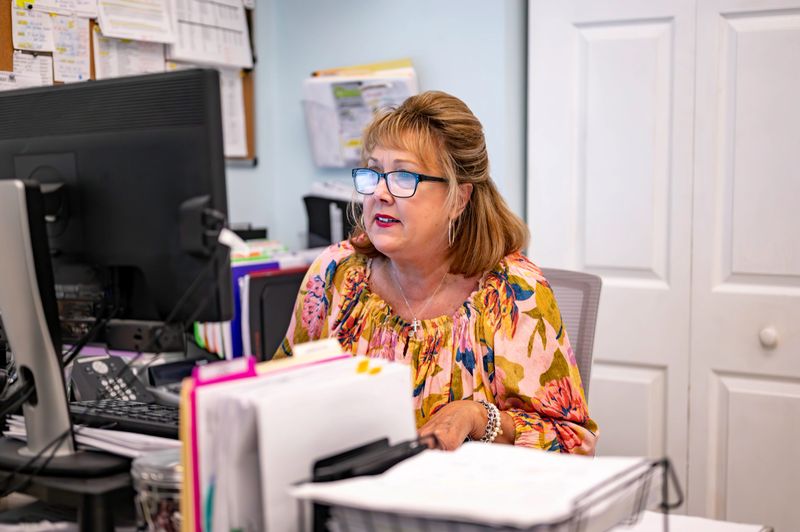 Woman in a mid level professional job at a non-profit