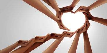 Hands forming a heart shape together.