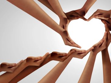 Hands forming a heart shape.