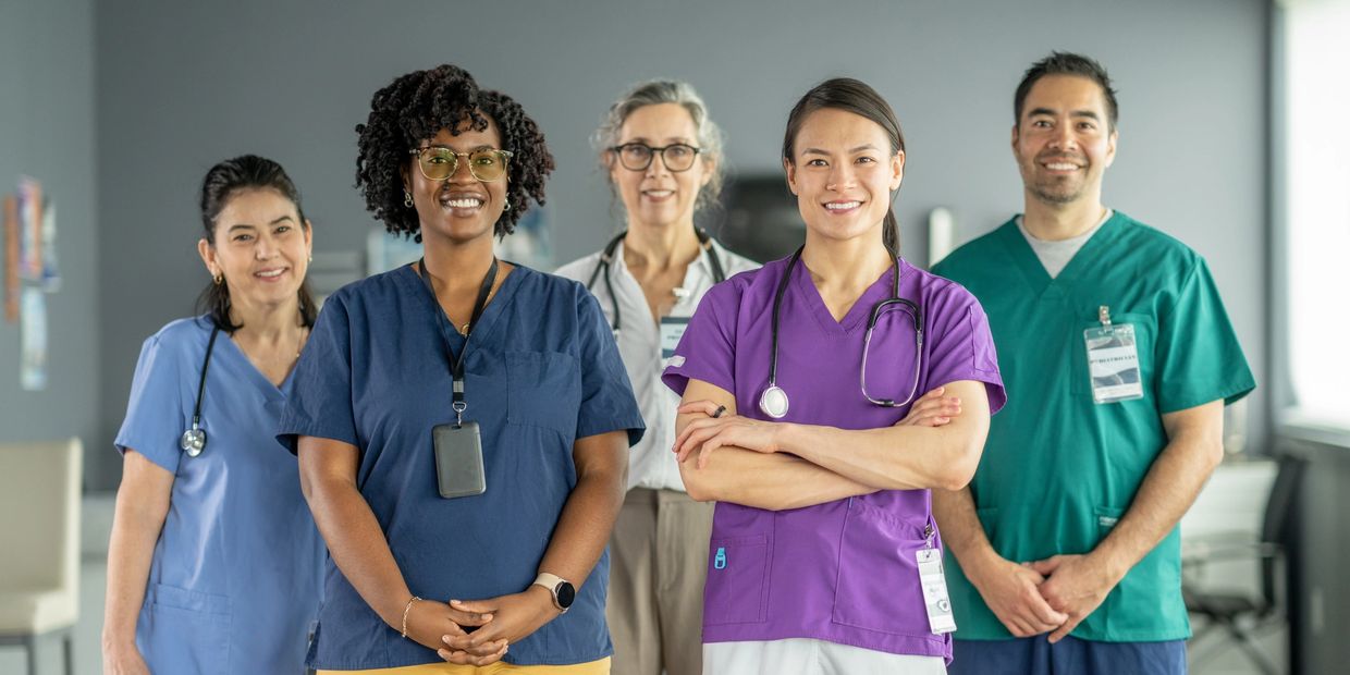 Diverse group of smiling healthcare professionals.
