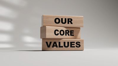 Wooden blocks with text 'OUR CORE VALUES'.