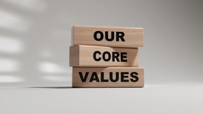 Wooden blocks stacked with the phrase 'Our Core Values' in bold black letters.