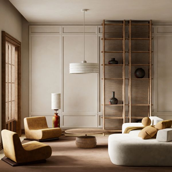 Minimalist living room with earthy tones and modern furniture.