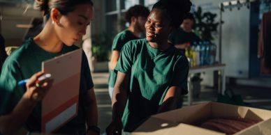 Volunteers sorting donations in a shelter.